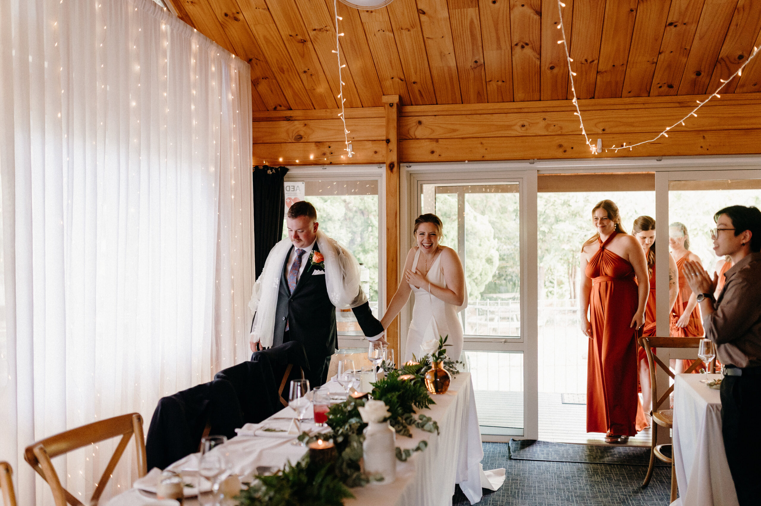 Find your seat chart on a wooden easel at the venue entrance