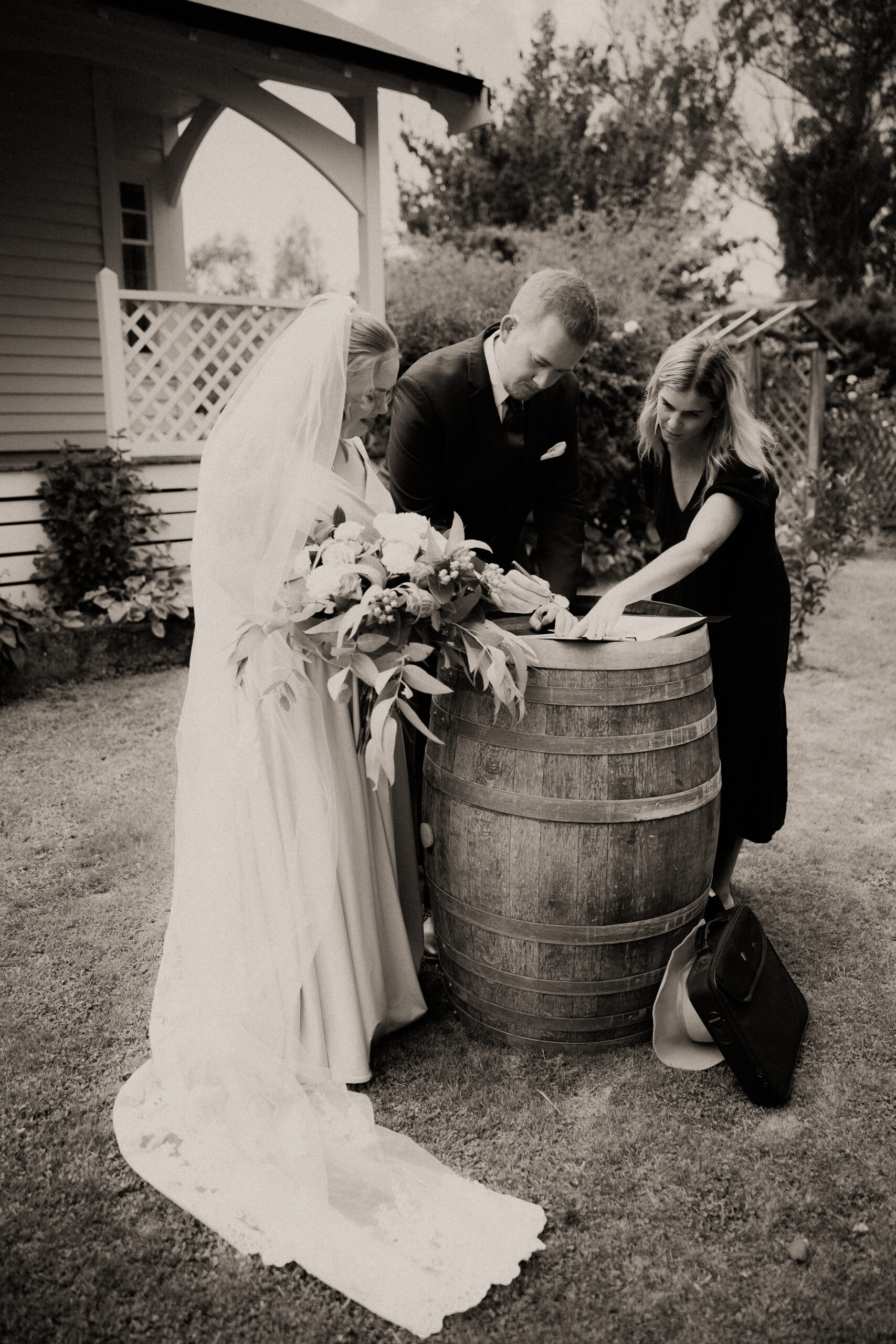 Welcome sign on a timber easel for Christopher and Callaghan's wedding