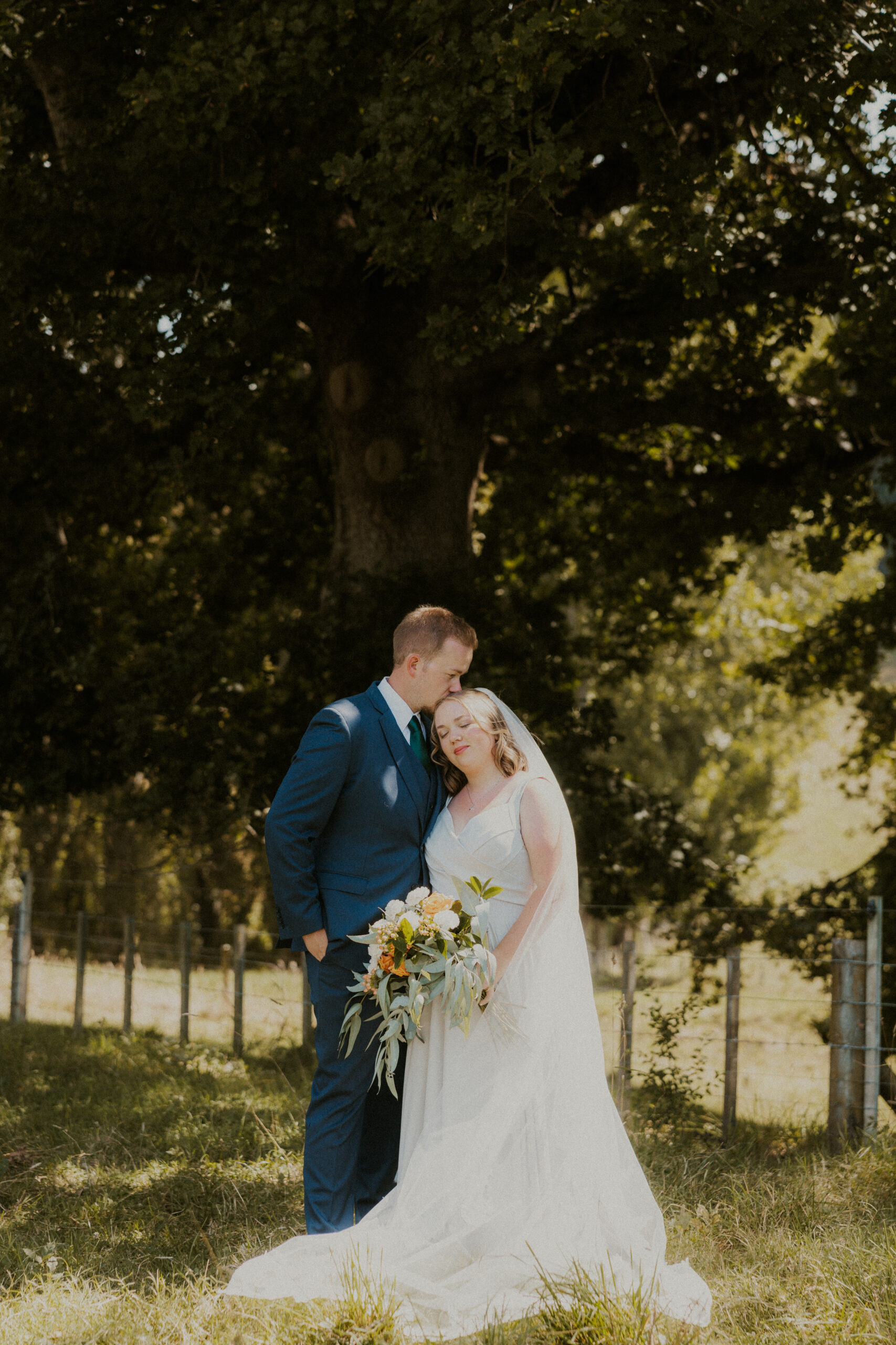 Welcome sign on a timber easel for Christopher and Callaghan's wedding
